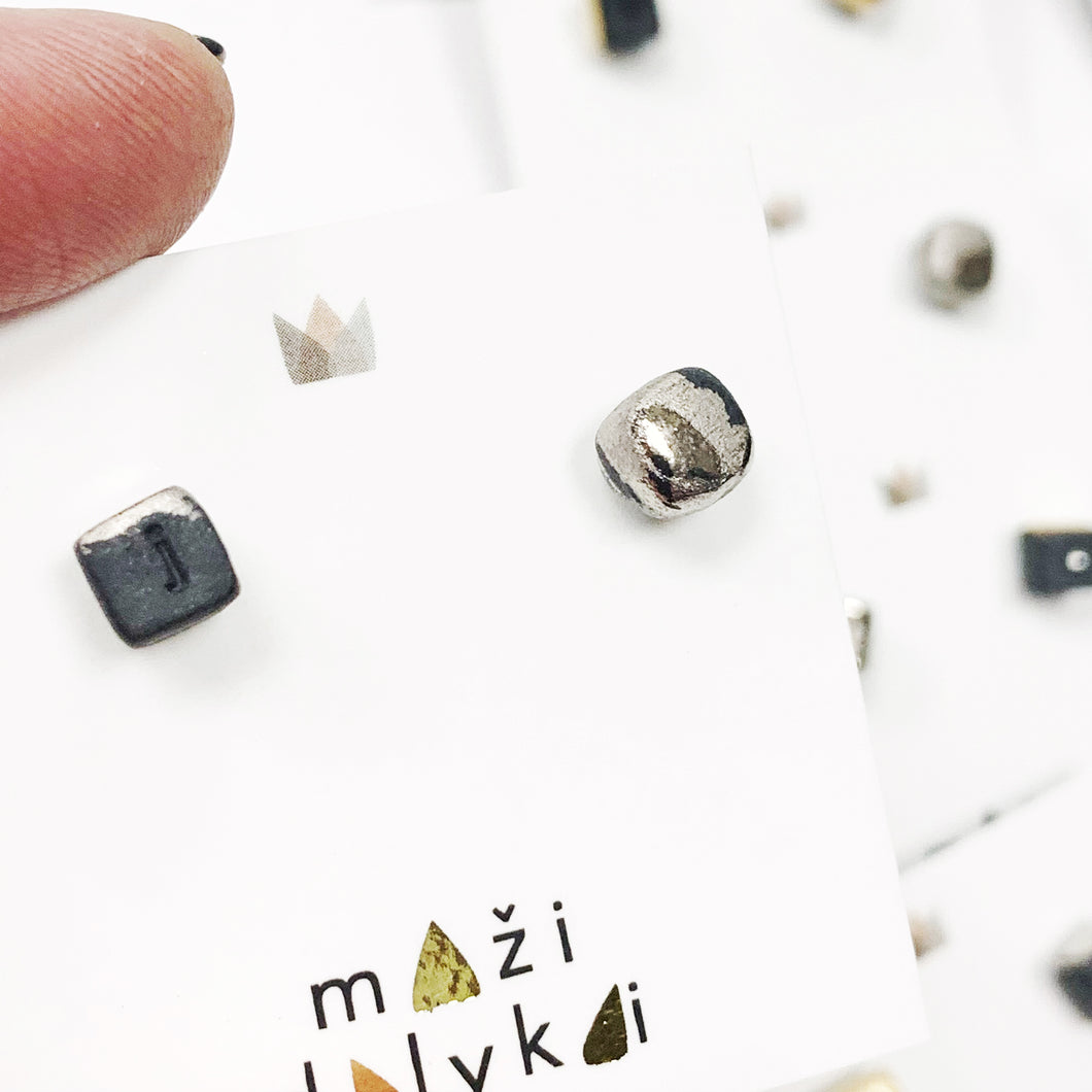 Black porcelain stud earrings WHAT IS YOUR NAME? j