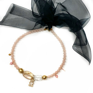 PEACHY HUGS necklace with porcelain beads and black silk ribbon