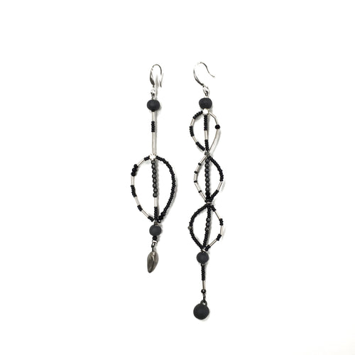 Long assymetric black porcelain earrings 