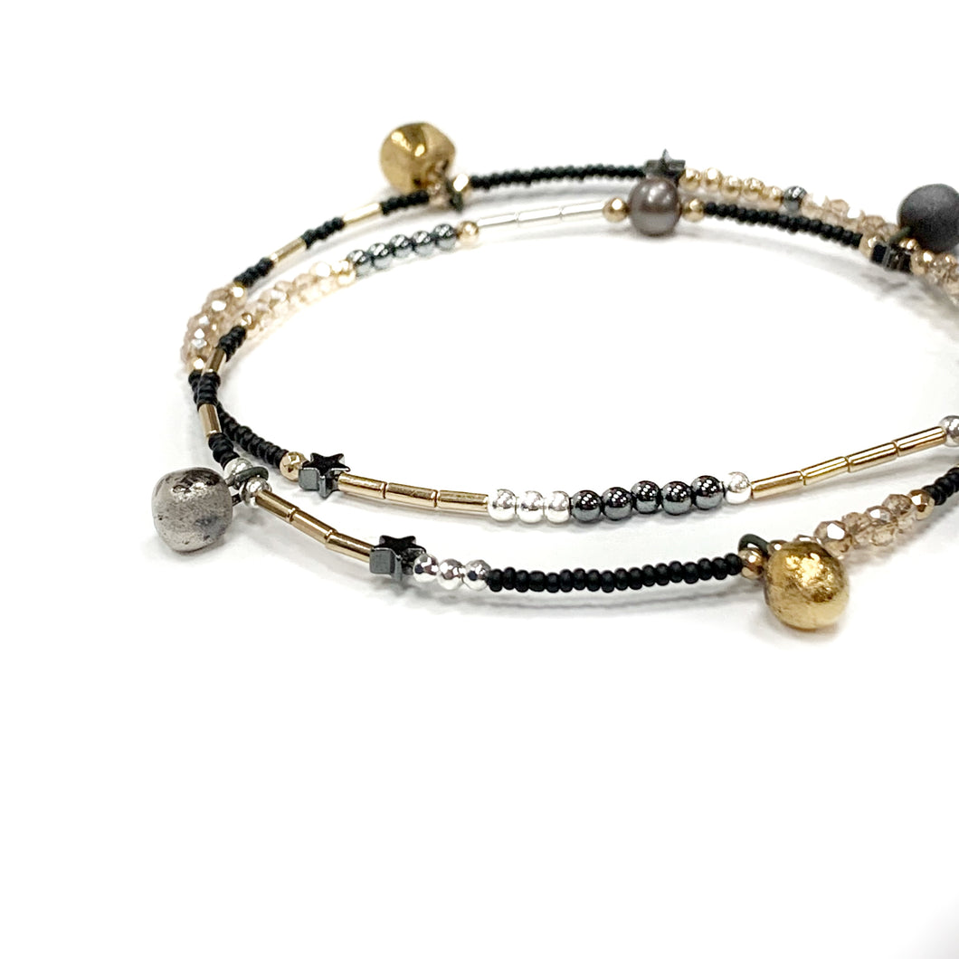 Necklace - bracelet with black porcelain pendants 