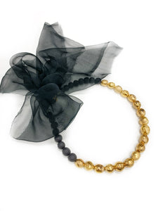 Especially precious black porcelain necklace with silk ribbon