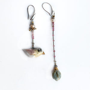 Ceramic mismatched earrings "Bird and its gentle flower"