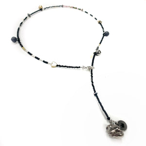 Minimalistic necklace - bracelet with black porcelain pendants